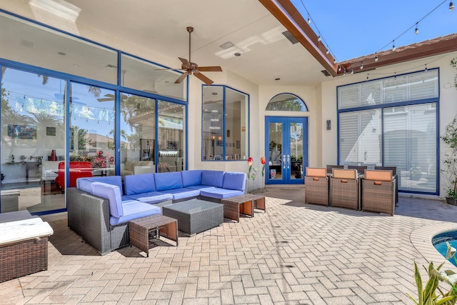 view of patio with outdoor lounge area, french doors, and ceiling fan