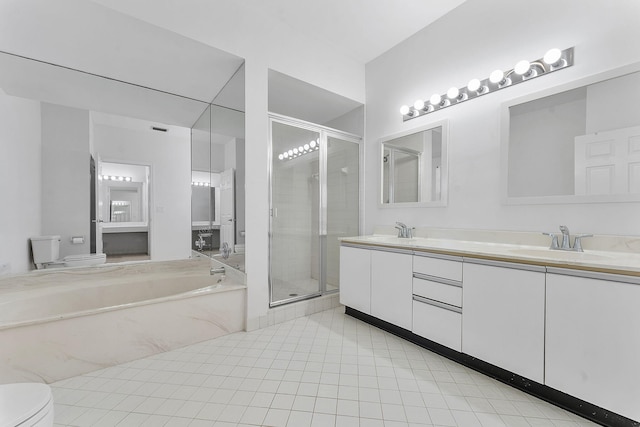 full bathroom with vanity, separate shower and tub, and toilet