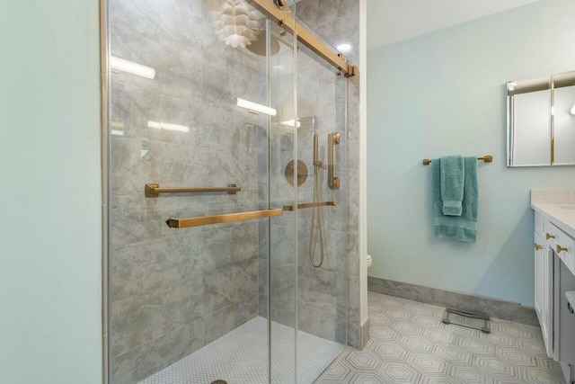 bathroom featuring tile patterned flooring, vanity, and an enclosed shower