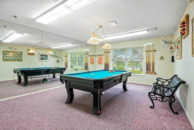 playroom with carpet flooring, a textured ceiling, and pool table