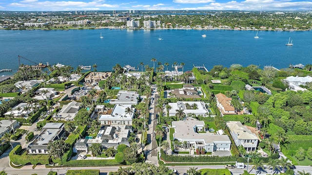 aerial view with a residential view and a water view