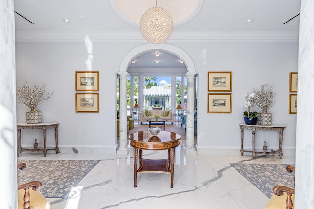 interior space with arched walkways, marble finish floor, decorative columns, and baseboards