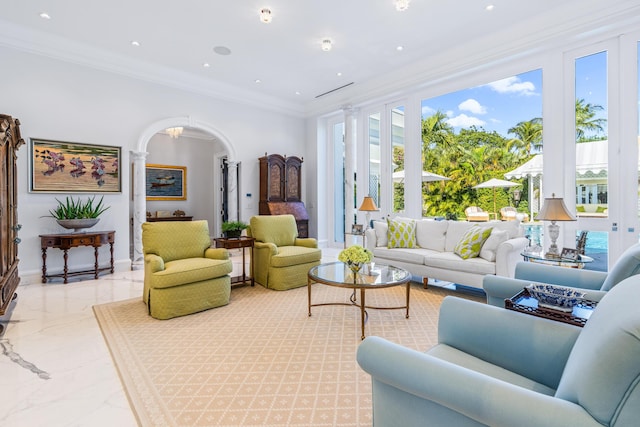 living room with arched walkways, recessed lighting, baseboards, marble finish floor, and crown molding