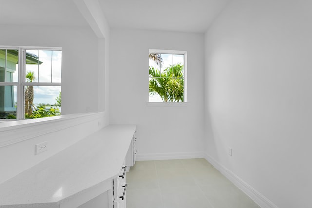 interior space with light tile patterned floors