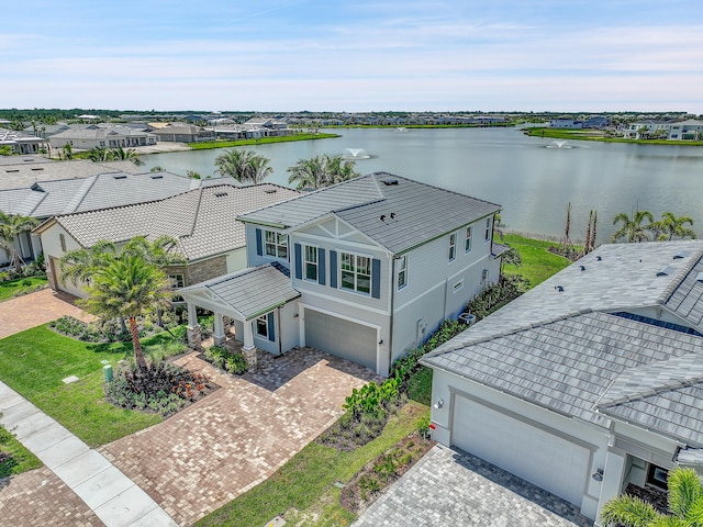 drone / aerial view with a water view