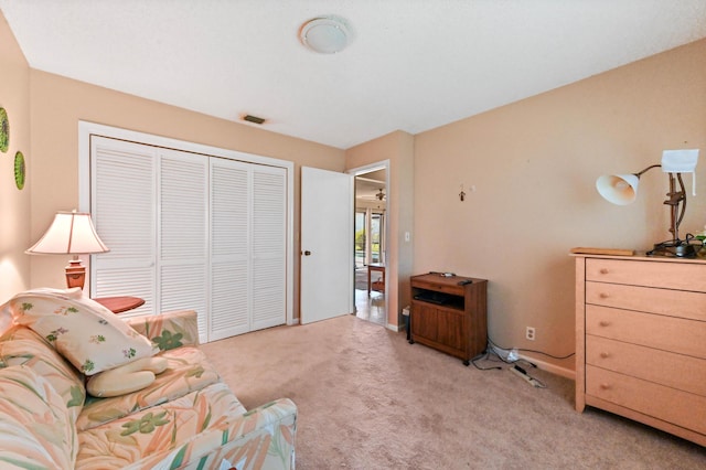 living area with light colored carpet