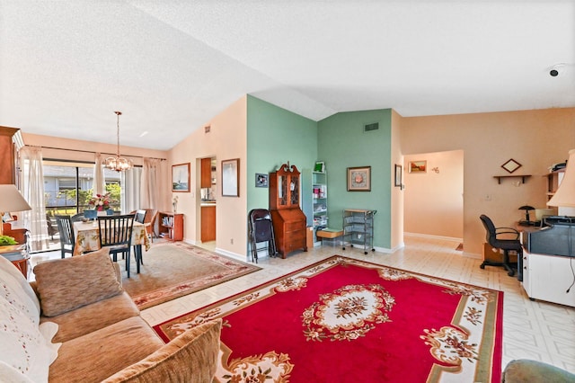 living room with an inviting chandelier and lofted ceiling