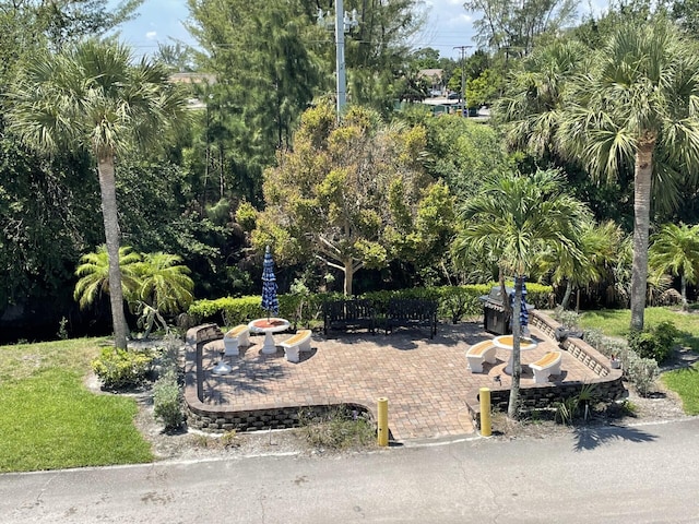 view of home's community featuring a patio area