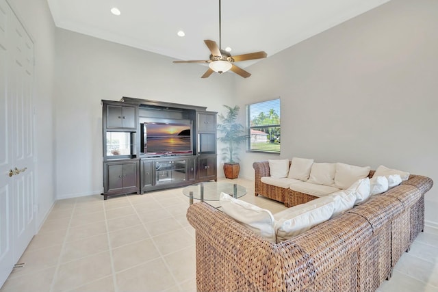 living room with ceiling fan and light tile patterned floors