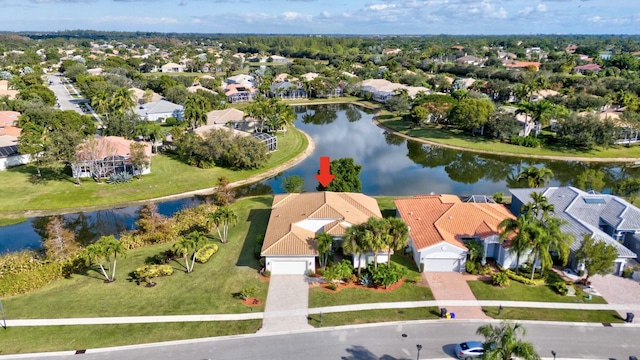 drone / aerial view with a water view