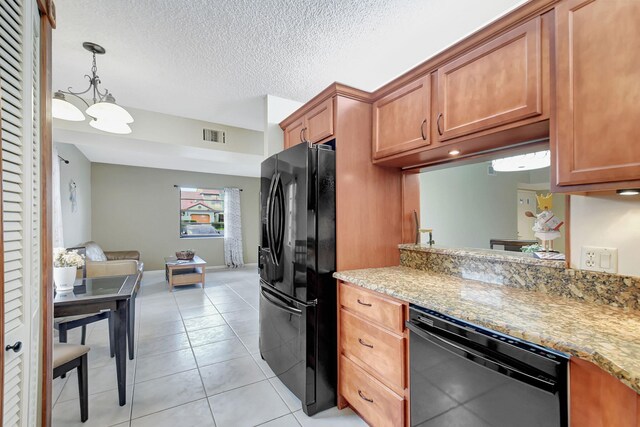 kitchen featuring black appliances, sink, light stone countertops, light tile patterned floors, and a textured ceiling