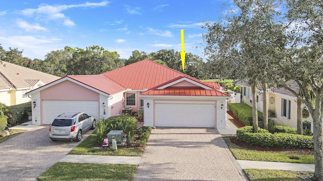 view of front of home featuring a garage