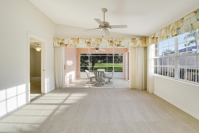 unfurnished sunroom featuring vaulted ceiling