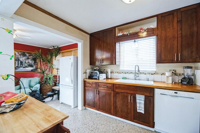 kitchen featuring ceiling fan, sink, white appliances, and ornamental molding