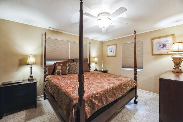 bedroom with ceiling fan and ornamental molding