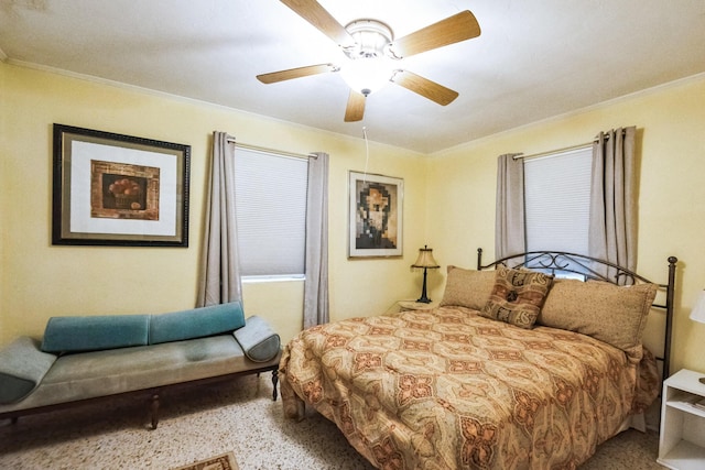 bedroom with ceiling fan and ornamental molding