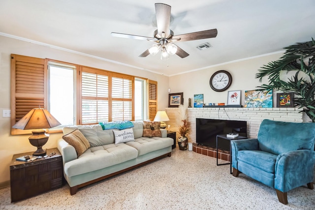 living room with ceiling fan and crown molding