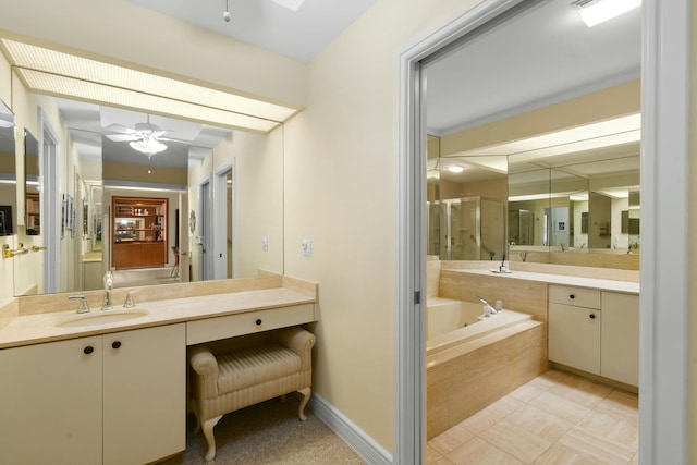 bathroom featuring tile patterned floors, plus walk in shower, vanity, and ceiling fan