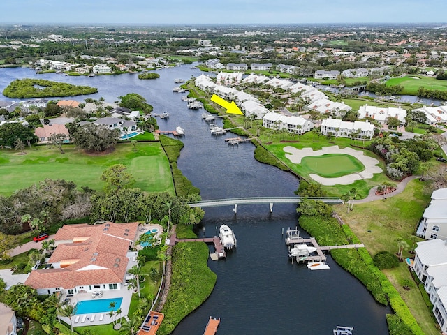 bird's eye view with a water view