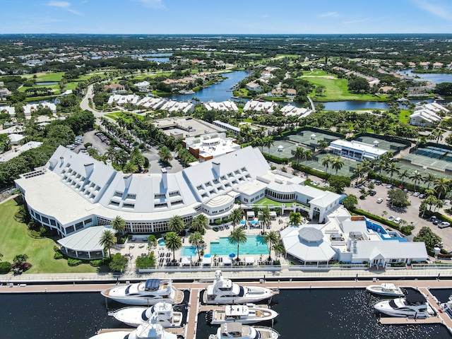 birds eye view of property with a water view