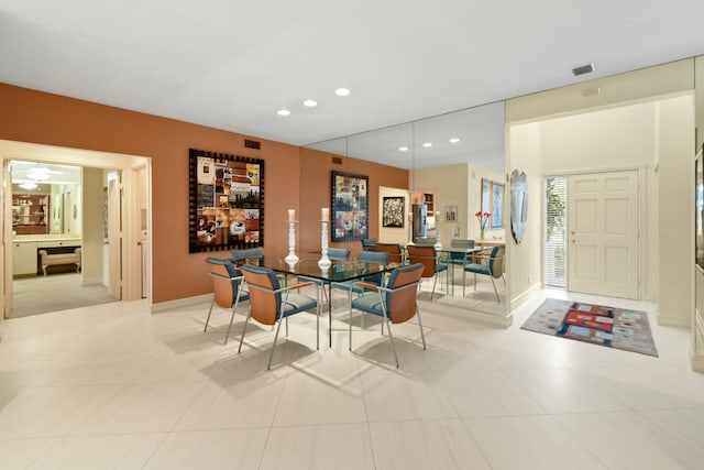 dining room featuring light tile patterned flooring