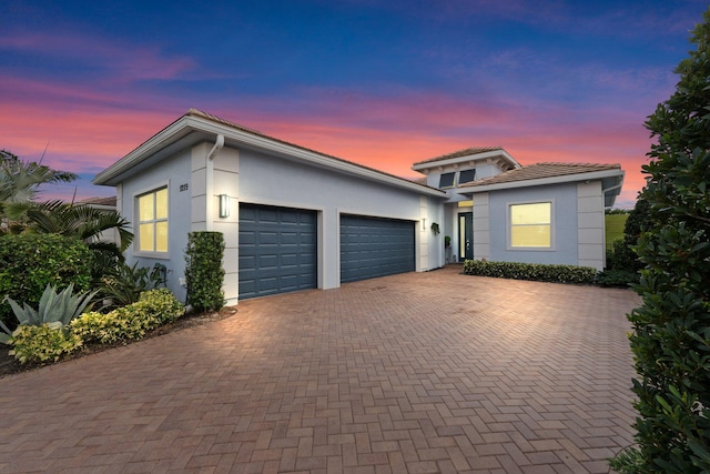 view of front of property featuring a garage