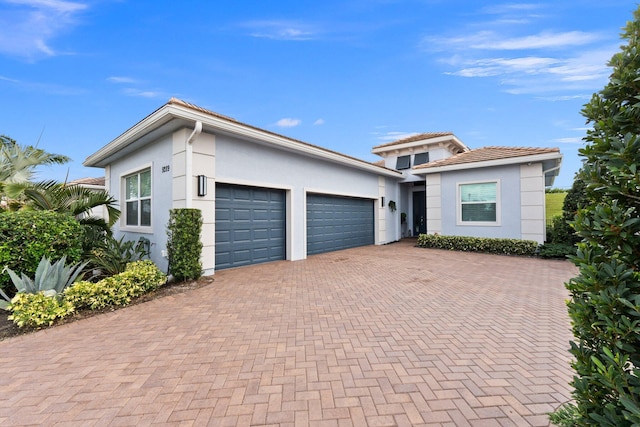 view of front of home with a garage