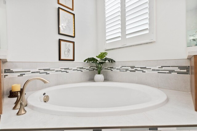 9289 SW Miracoli Way, Port Saint Lucie, FL 34987 - bathroom featuring a garden tub