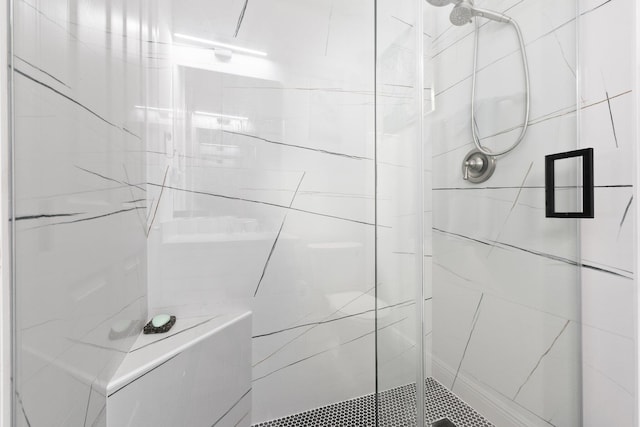 bathroom with an enclosed shower