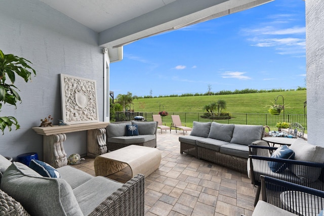 9289 SW Miracoli Way, Port Saint Lucie, FL 34987 - fenced backyard featuring outdoor lounge area, a patio, and a view of countryside