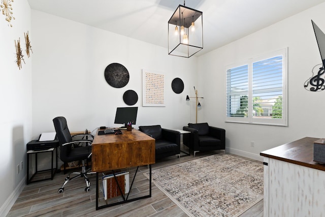 office area with hardwood / wood-style flooring