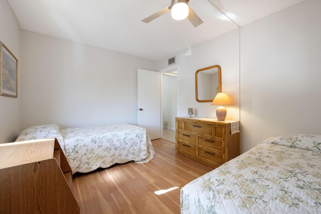 bedroom featuring ceiling fan and light wood-type flooring