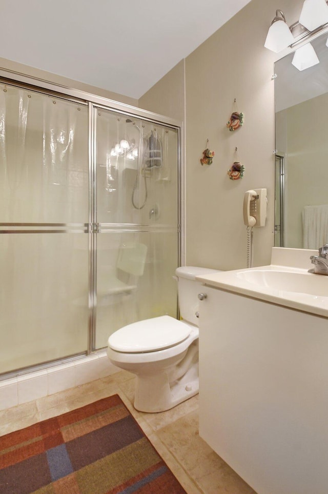 bathroom with radiator heating unit, walk in shower, tile patterned floors, toilet, and vanity