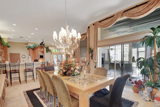 dining room featuring light tile patterned floors, an inviting chandelier, french doors, and ornamental molding