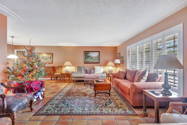 tiled living room with a textured ceiling