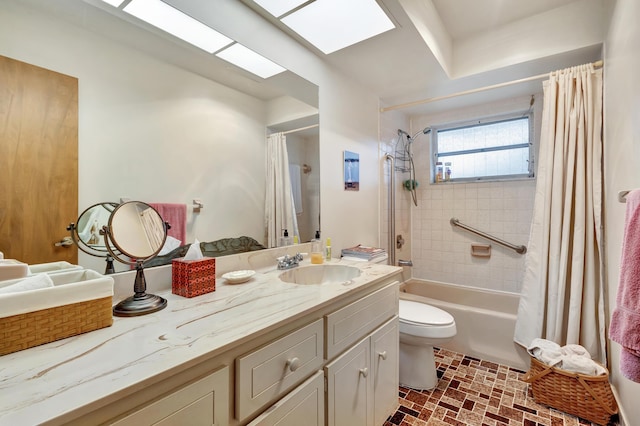 full bathroom featuring toilet, vanity, and shower / tub combo with curtain