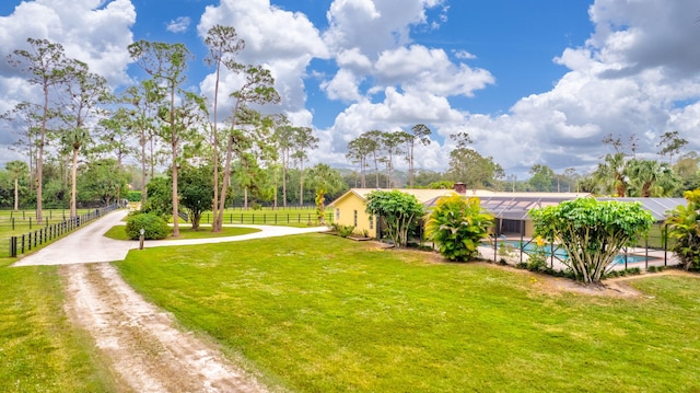 view of yard featuring a lanai