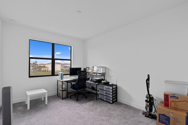 home office with light colored carpet