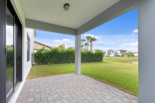 view of patio / terrace with a water view