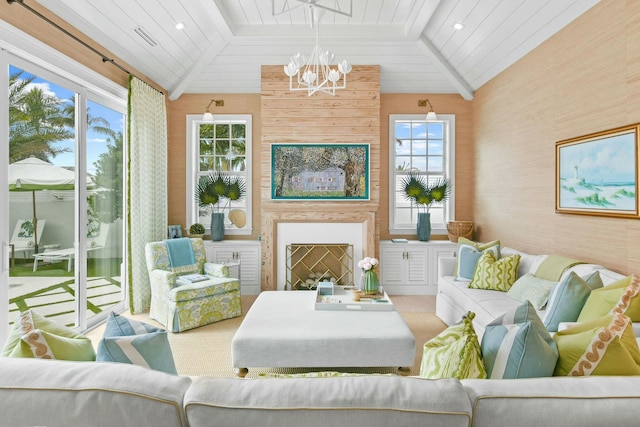 living room featuring vaulted ceiling, a notable chandelier, and wooden walls