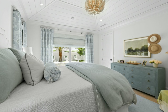 bedroom featuring lofted ceiling and wood ceiling