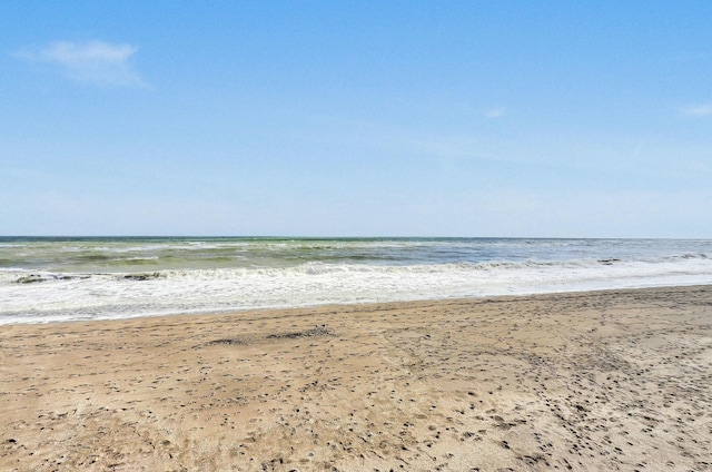 property view of water featuring a beach view