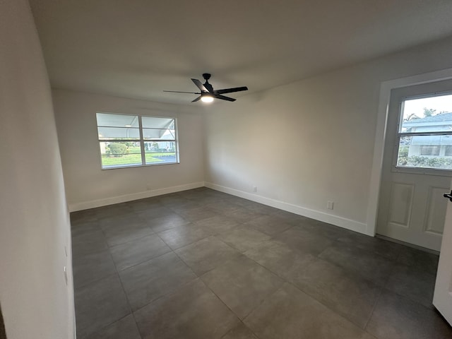 spare room featuring ceiling fan