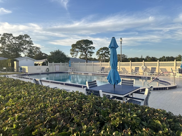 view of pool with a patio area