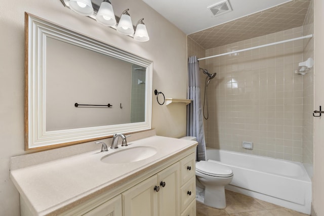 full bathroom featuring tile patterned floors, vanity, shower / tub combo, and toilet