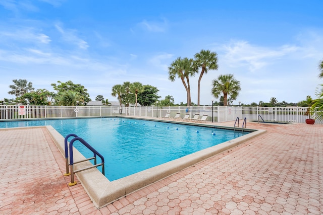 view of pool featuring a patio area