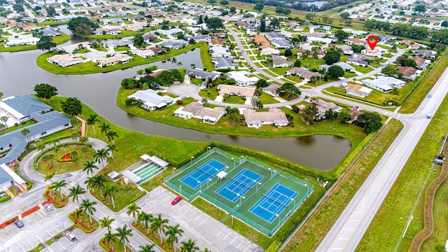 bird's eye view with a water view