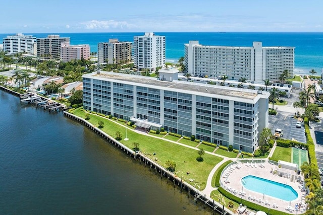 birds eye view of property featuring a water view