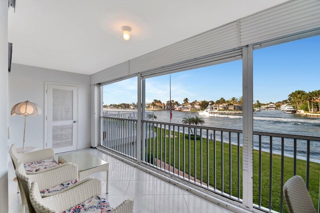 sunroom with a water view