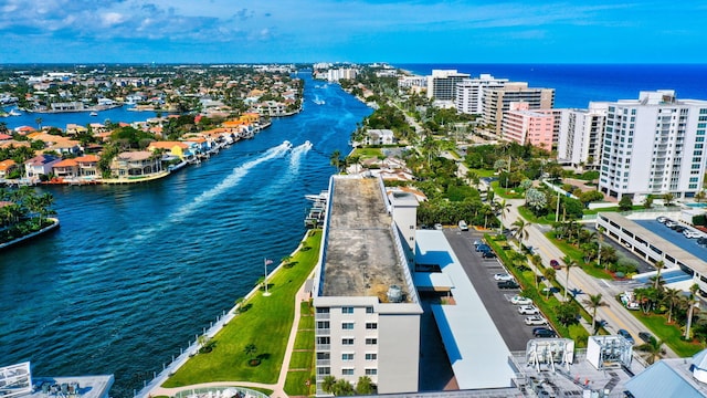 birds eye view of property featuring a water view